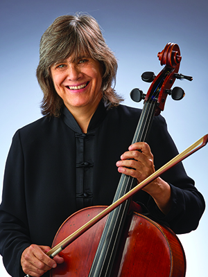 Woman posing with cello